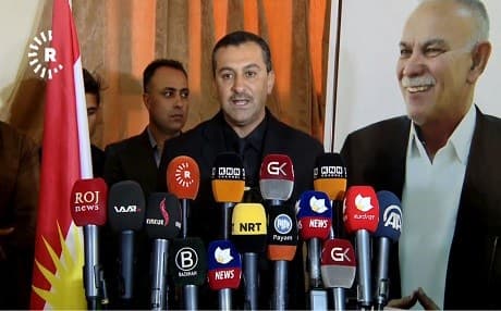 File photo shows Haval Abubakir [C], a Gorran candidate for the position of the governor of Sulaimani, speaks at a press conference in Sulaimani following the death of the party's founder Nawshirwan Mustafa in May 2017. Photo: Rudaw TV