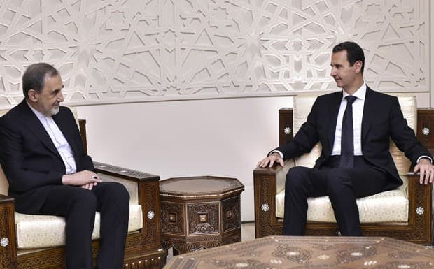Syrian President Bashar al-Assad (R) met with Ali Akbar Velayati, senior advisor to Iran’s Supreme Leader, in Damascus on Tuesday. Photo: SANA