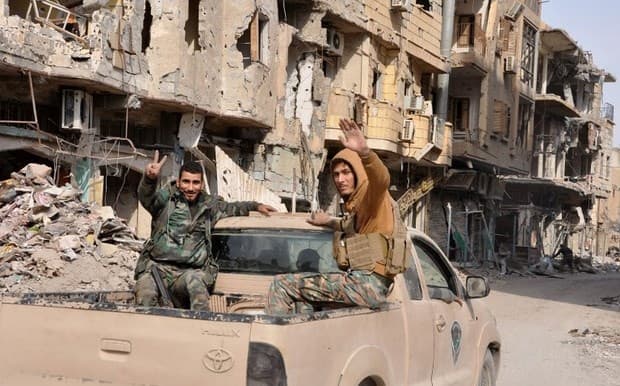 Pro-Syrian government forces in the city of Deir ez-Zor. Photo: AFP