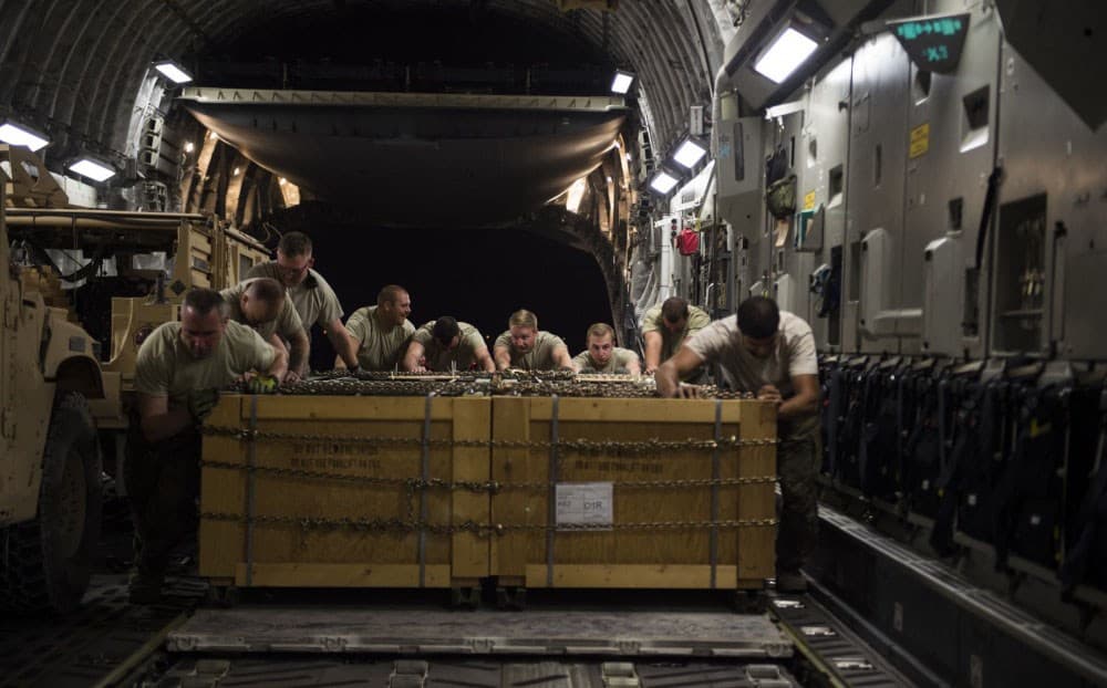 US Air Force personnel load cargo for delivery to US and coalition forces in Syria in October. US forces are arming Kurdish forces and working with them on the ground in the war against ISIS in Syria. Photo: US Air Force