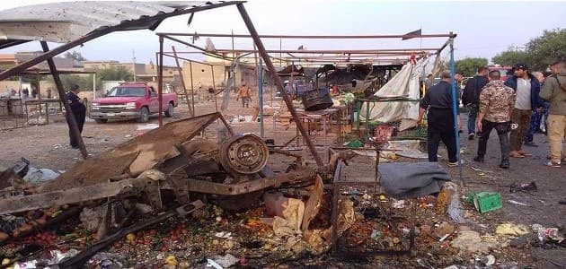 Photo shows the aftermath of a deadly car bomb attack that targeted a local market in the Kurdish neighborhood of al-Askari in Tuz Khurmatu on November 21, 2017. Photo: Afaq TV