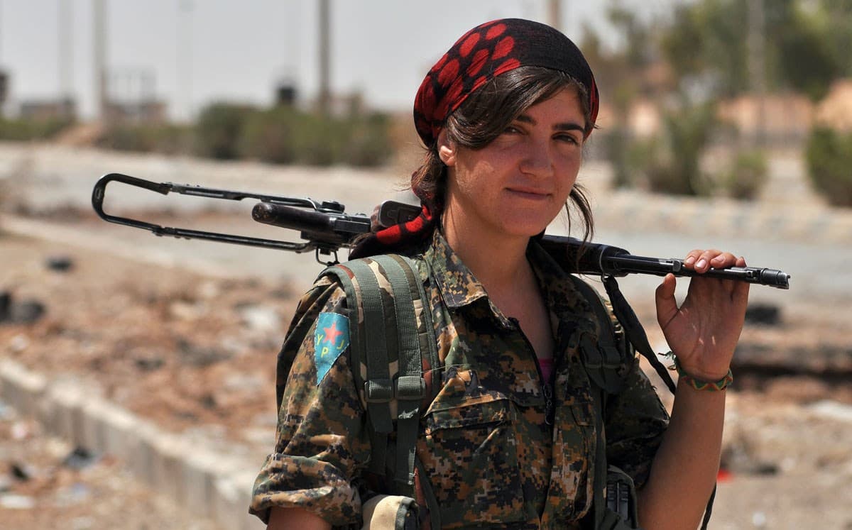 A Kurdish fighter poses for a photo in Hasakah province. File photo: Delil Souleiman/AFP