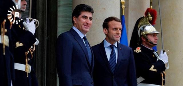 French President Emmanuel Macron [R] welcomes the KRG Prime Minister Nechirvan Barzani [L] at Elysee Palace in Paris on December 2, 2017. Photo: AFP/Thomas Samson