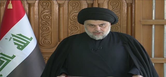 Iraq's firebrand Shiite leader Muqtada al-Sadr addresses Iraqis in a televised speech in light of the declaration of the end of ISIS war on Monday. Photo: Video screenshot