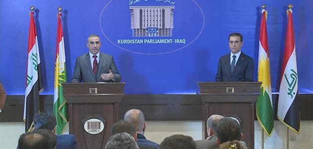 Sherko Jawdat [L], Chair of the Natural Resources Committee at the Kurdish parliament, holds a joint press conference with Amanj Rahim, the Secreteray of the KRG’s Council of Ministers, in Erbil on December 13, 2017. Photo: Rudaw TV