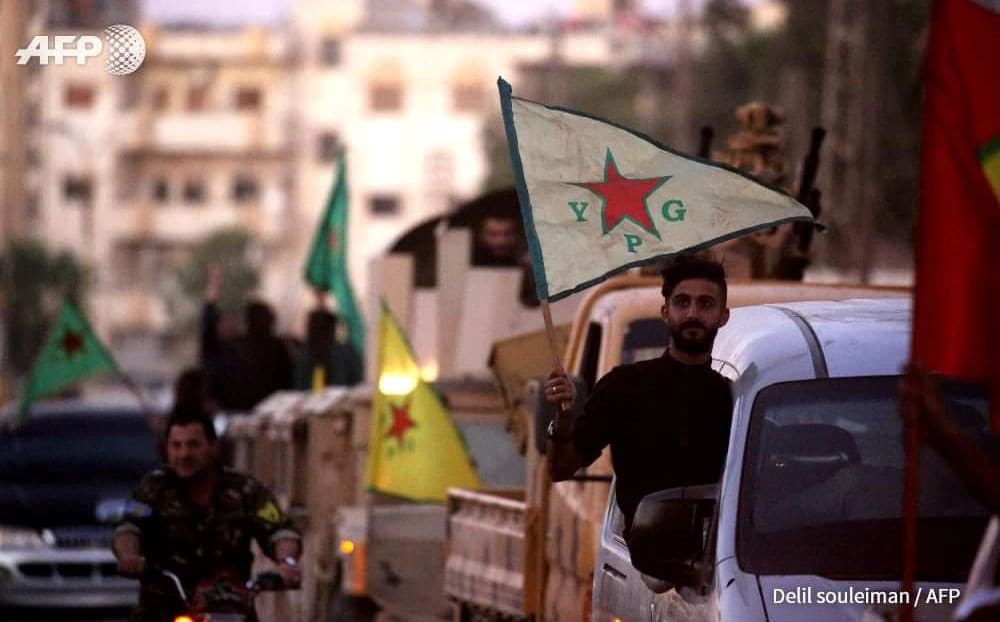 Kurds in Qamishli celebrate the defeat of ISIS in Raqqa in October. Photo: Delil Souleiman/AFP
