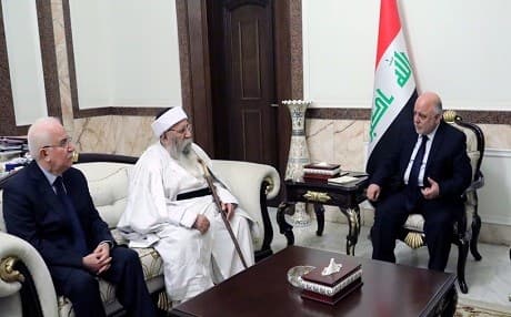 Iraqi Prime Minister Haider al-Abadi [R] received the spirtual leader of the Yezidi community on December 17, 2017 in Baghdad. Photo: PM media office