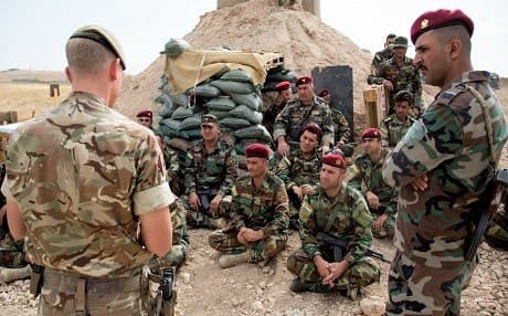 A British army trainer gives instruction during land navigation training at the Kurdistan Training Coordination Center in Bnaslawa on October 9. Photo: Sgt. Tracy McKithern | US Army