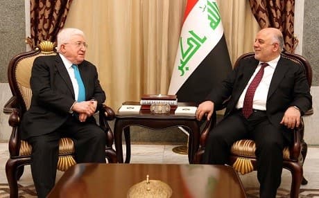 Iraqi President Fuad Masum [L] and Prime Minister Haider al-Abadi meet in Baghdad in April 2017. File photo: Iraqi PM Office
