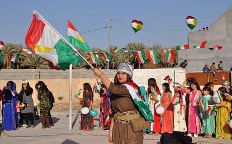 Kurdish student takes part in the Kurdish flag day in December 2017. Some Kurdish teachers have threatened that they will boycott their classes if they are not paid their full salary on time. Photo: KRG education ministry. 