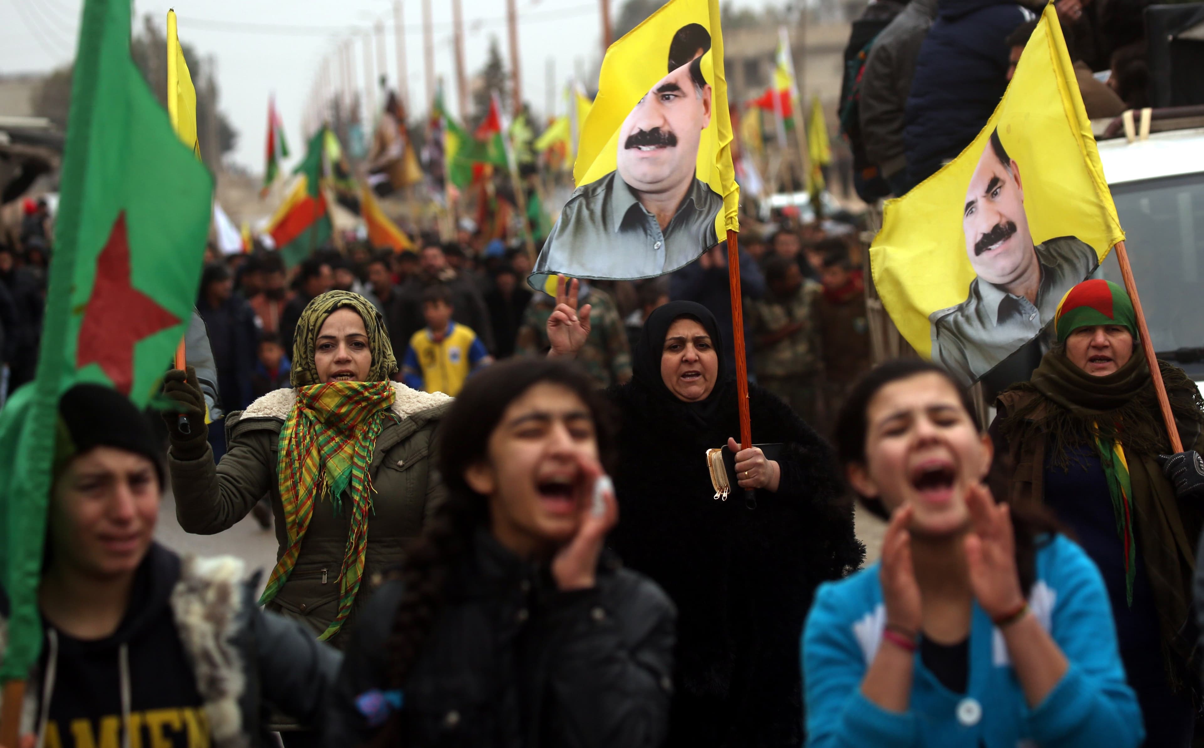 Kurds in the Rojava town of Jawadiyah march in support of Afrin on Thursday. Photo: Delil Souleiman/AFP