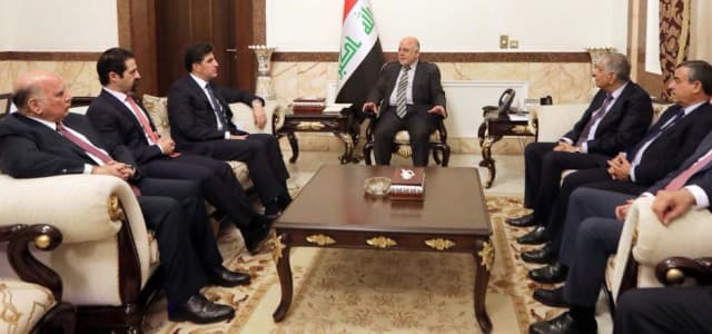 Iraqi Prime Minister Haider al-Abadi [M] receives a Kurdish delegation headed by Prime Minister Nechirvan Barzani [L] in Baghdad on January 20, 2018. Photo: Iraqi PM office