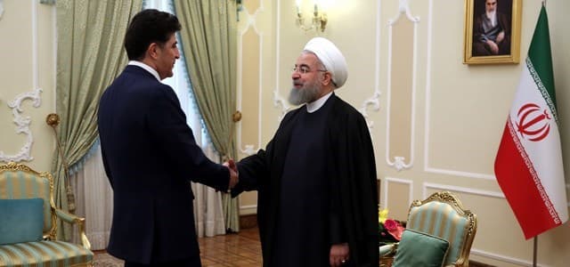 KRG Prime Minister Nechirvan Barzani (L) shakes hands with Iranian President Hassan Rouhani in Tehran on January 21, 2018. Photo: Iranian presidency