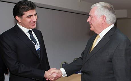 KRG PM Nechirvan Barzani and US Secretary of State Rex greet each other in Switzerland on January 25, 2018. Photo: Rudaw