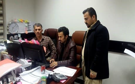 Photo shows Kurdish employees prepare the list of their employees in the health department to be sent to the Iraqi government. Photo: Halabja health department