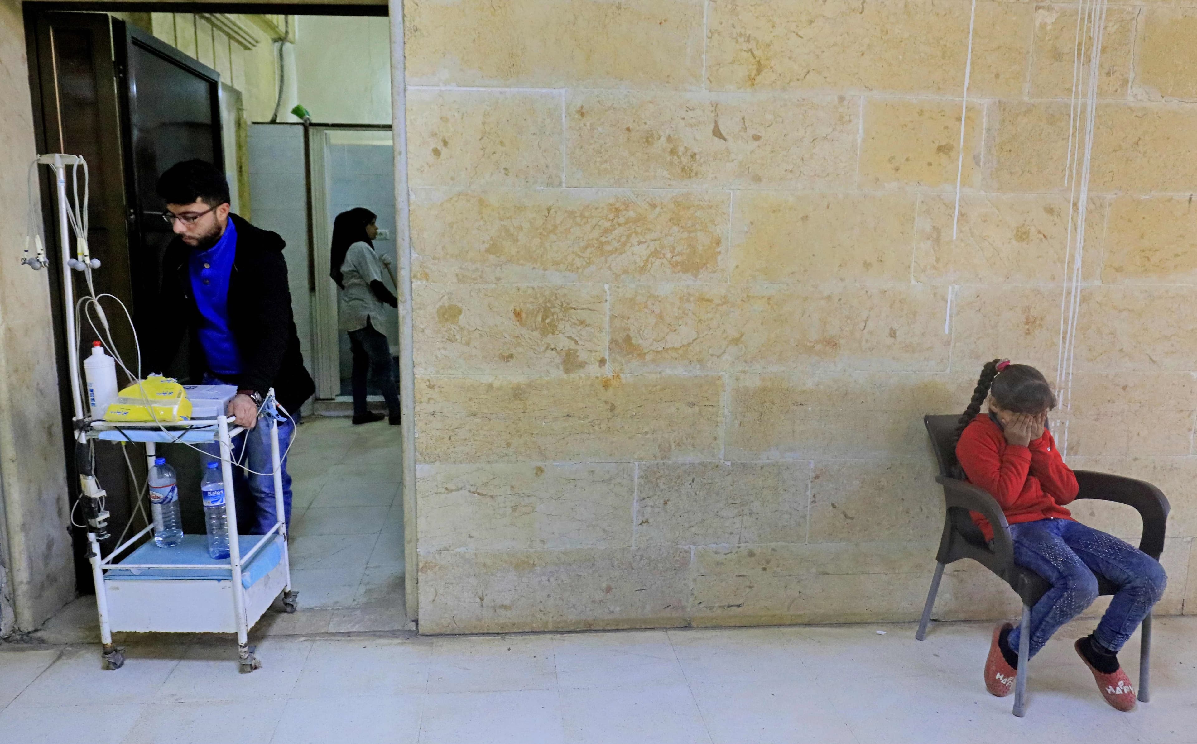 A Kurdish girl cries at Afrin Hospital where her wounded relatives are receiving treatment after reportedly being injured in a Turkish rocket attack on Wednesday. Photo: Delil Souleiman/AFP