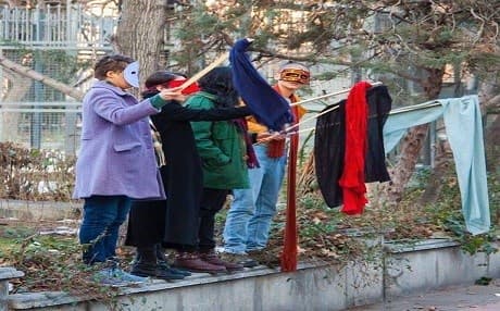 A group of people demonstraiting the mandatory hijab in Iran. Photo: Facebook / My Stealthy Freedom