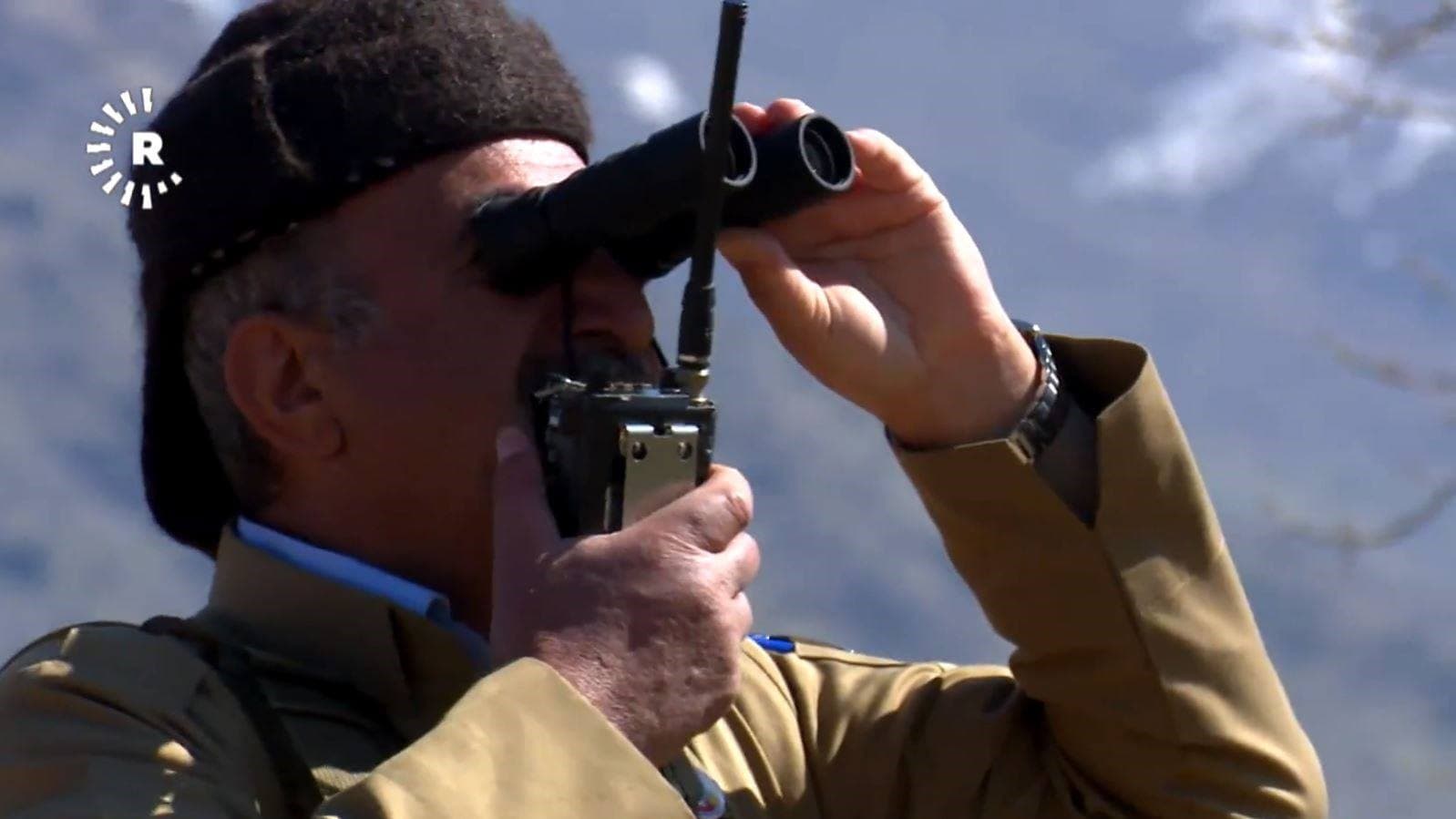 A PDKI commander in the Zagros mountains surveys the battlefield. Photo: Rudaw