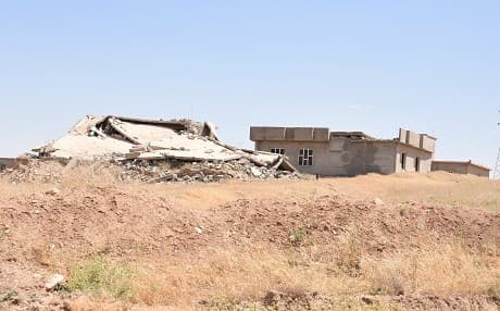 A building shown destroyed during the ISIS conflict in northern areas Shingal on June 6, 2018. Photo: Chris Johannes | Rudaw