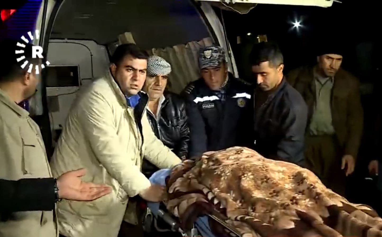 The body of one believed migrant arrives at Soran hospital. Photo: Rudaw TV