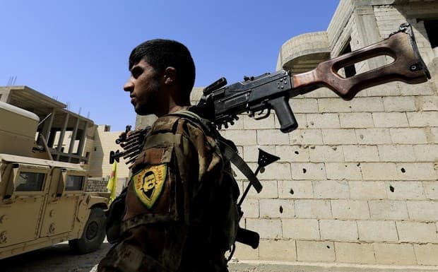A member of the SDF pictured in Raqqa. File photo: AFP