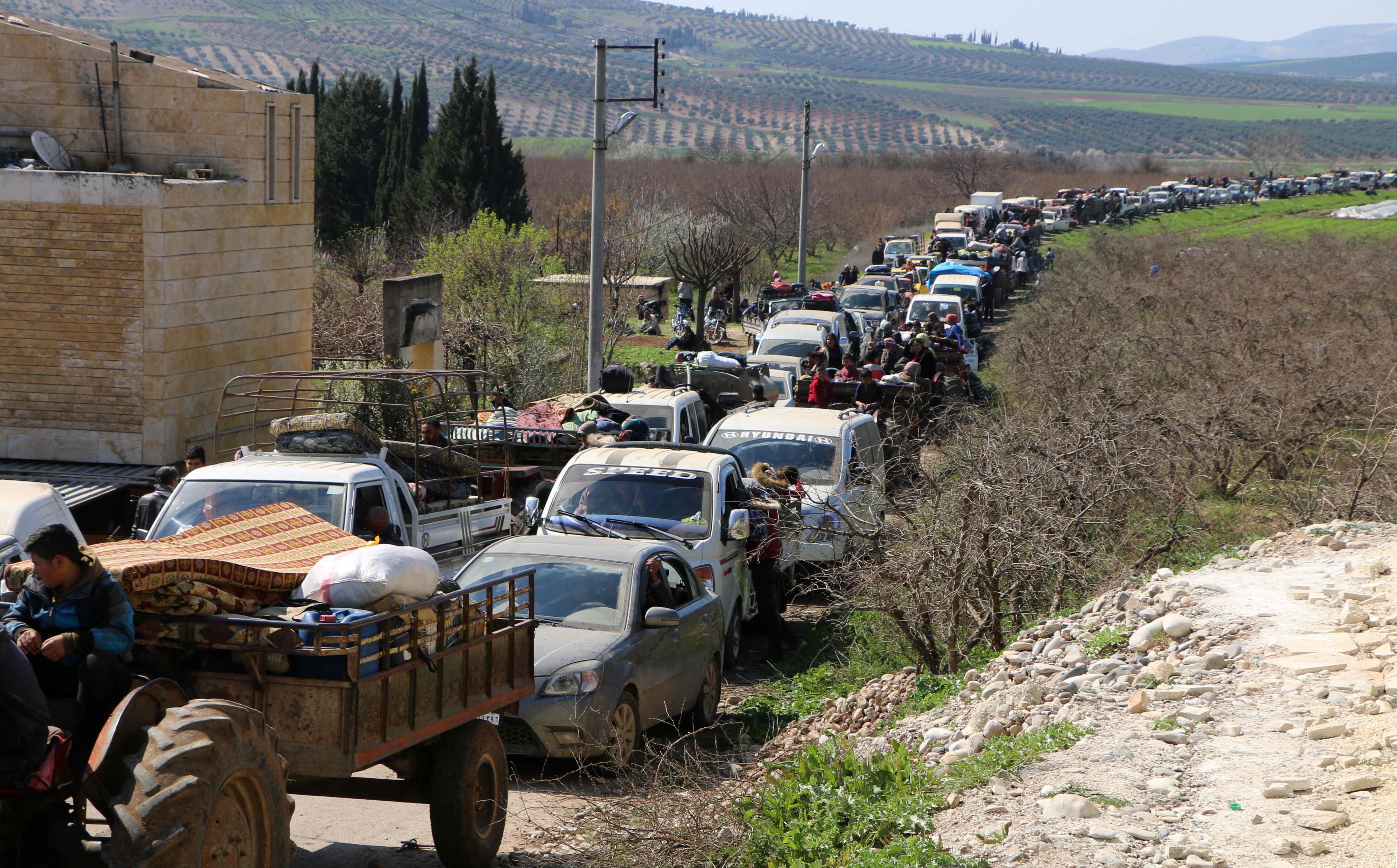 Hundreds of civilians are fleeing Afrin city as Turkish forces advance. Photo: AFP
