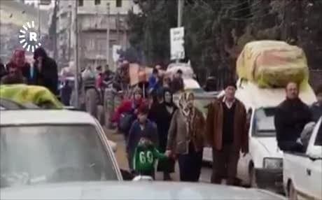 People in Afrin flee out of the city on March 16, 2018. Video: Rudaw TV