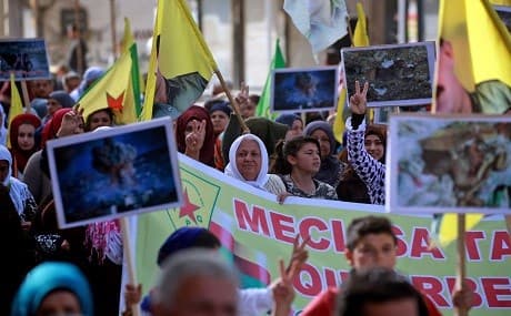 Syrian-Kurds demonstrate in Qamishli against Turkish-led fighters seizing control of Afrin city on March 18, 2018. Photo: Delil Souleiman / AFP
