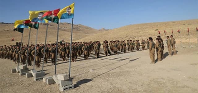  نمایشێکی سەربازیی یەبەشە لە ساڵی 2015 دا لە شنگال، باڵێکی دیکەی پەکەکەیە و بۆ کوردانی ئێزدی دامەزراوە
