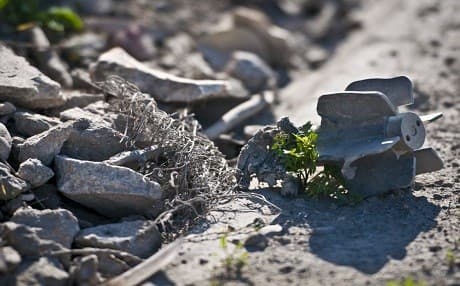 A mortar fin lays amongst the rubble in the streets of Raqqa, Syria, March 13, 2018. Photo: Staff Sgt. Timothy Koster | US Army