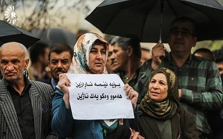 A striking civil servant in Sulaimani protests inequality earlier this week. Photo: Sartip Othman/Rudaw