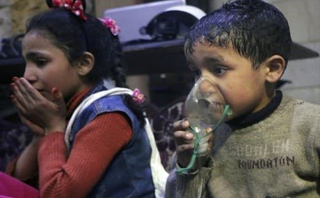 Child receives oxygen through respirators following an alleged poison gas attack in the rebel-held town of Douma, near Damascus, Syria. Photo: Syrian Civil Defense White Helmets / AP 