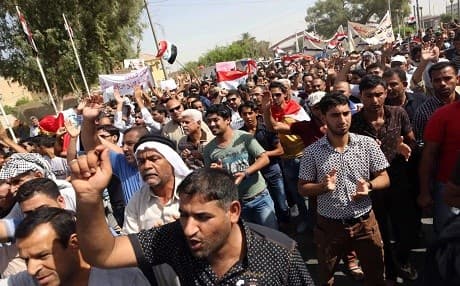 In this file photo from 2015, Basra residents chant for the creation of an autonomous region. Photo: AP