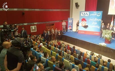 Kurdish TV crews were barred from entering the hall that was cut in half with strategically placed campaign photos. Photo: Chris Johannes/Rudaw