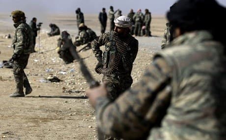 SDF forces pictured in Deir ez-Zor province last year. File photo: Delil Souleiman/AFP