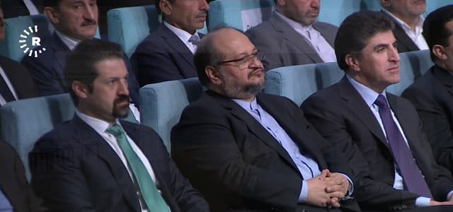 Mohammed Shariatmadari, Iran’s Minister of Industry, Mines and Business, is flanked by KRG Prime Minister Nechirvan Barzani (right) and his deputy Qubad Talabani at a trade conference in Erbil on May 2, 2018. Photo: Rudaw