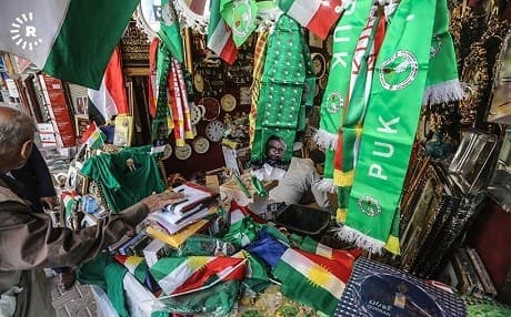 Campaign posters fill a shop in Sulaimani ahead of Iraqi parliamentary elections. Photo: Sartip Othman | Rudaw