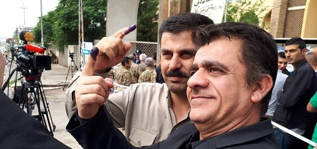 Military personnel with special early voting status head to the polls. Photo: Rudaw