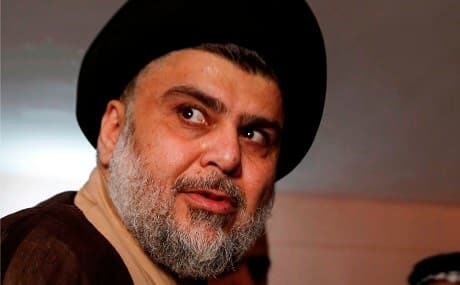 Iraqi Shiite cleric and leader Moqtada al-Sadr inside a polling station in the central holy city of Najaf on May 12, 2018. Photo: Haidar Hamdani / AFP