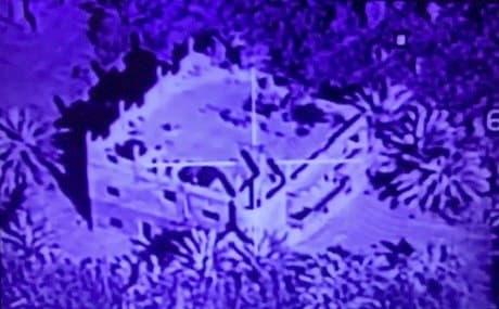 An image grab taken from an video released by the Iraqi Security Media Centre early on May 25, 2018, shows an airstrike by the Iraqi air force targeting a huge building in the Syrian area of Hajin, near the border with Iraq. Photo: IRAQI SECURITY MEDIA CENTRE / HO / AFP