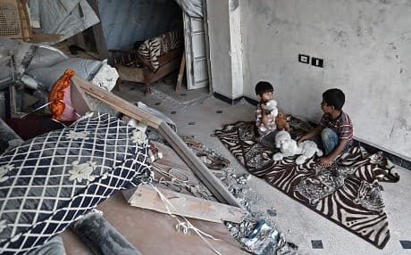 Syrian children Saad (L) and Mohamad, sons of Mehdi Haymur play in Afrin, on May 26, 2018. Photo: Nazeer al-Khatib/AFP