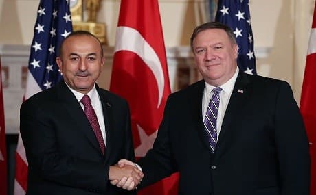 Secretary of State Mike Pompeo (R), greets Turkish Foreign Minister Mevlut Cavusoglu, before a meeting at the Department of State on June 4, 2018 in Washington, D.C. Photo: Mark Wilson / Getty Images / AFP