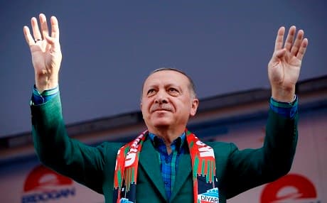 Turkish President Recep Tayyip Erdogan greets the crowd during a campaign rally in Diyarbakir this week. Photo: Kayhan Ozer/Presidential Palace/AFP