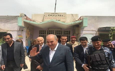 Ayad Allawi waves to the cameras after voting in Iraq's parliamentary election on May 12. Photo: Allawi FB