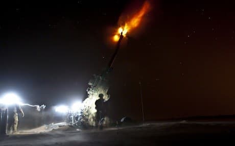 Coalition members fire an artillery round using an M777 Howitzer toward a known ISIS location near Dashisha, Syria, June 8, 2018. Photo: Staff Sgt. Timothy R. Koster | US Army