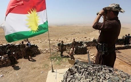 The Flag of Kurdistan flies on the outskirkts of Kikruk in October 2017. Photo: Ahmed al-Rubaye | AFP