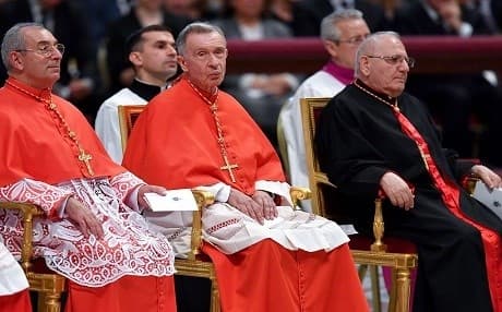 From left: Angelo De Donatis General Vicar of Rome, Luis Francisco Ladaria Ferrer prefect of the Congregation for the Doctrine of the Faith and Louis Raphael I Sako patriarch of Babylon of the Chaldeans attend the consistory where Pope Francis creates 14 new cardinals on June 28, 2018 at St Peter's basilica at the Vatican. Photo: Andreas Solaro/AFP