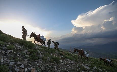 Turkish forces use donkeys to carry supplies in Kurdistan Region’s Avashin-Basyan region. Photo: Ozkan Bilgin/Anadolu Agency