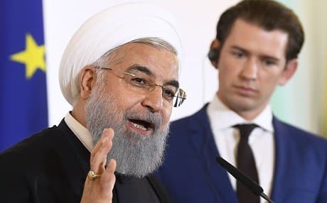 Austria's Chancellor Sebastian Kurz listens to Iranian President Hassan Rouhani (L) during a joint press conference following a meeting on Wednesday in Vienna. Photo: Robert Jaeger/APA/AFP