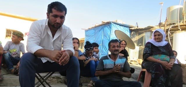 Camp council member Ashkan (left) fled Iran to the Kurdistan Region ten years ago when he was 20. Photo: A.C. Robinson